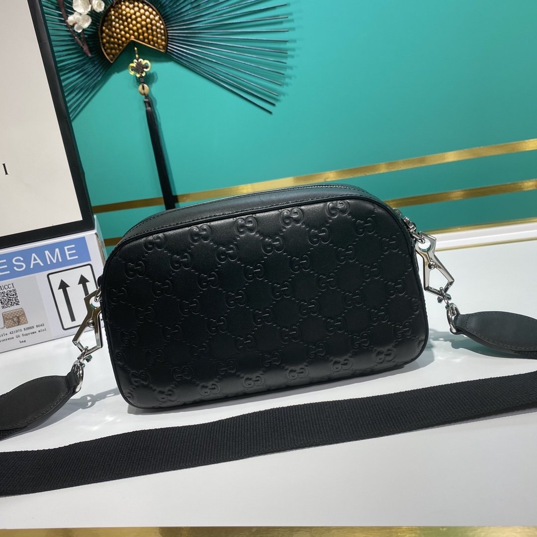 Gucci GG Embossed Crossb